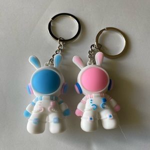 Space astronaut pink and blue key chain